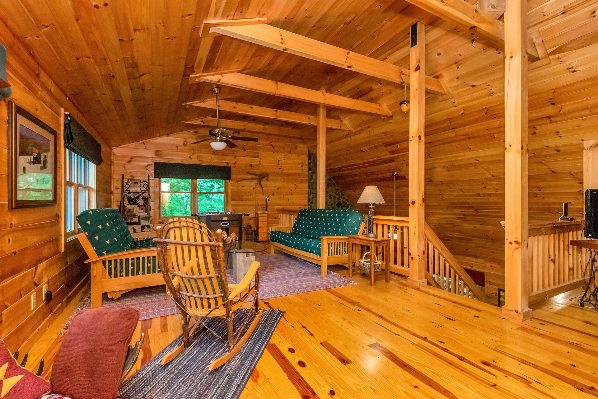 It currently features two futons, offering additional sleeping areas.